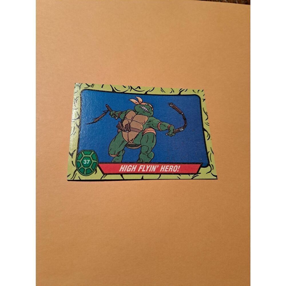 1989 Topps TMNT High Flyin Hero Trading Card 37 Teenage Mutant Ninja Turtles - Picture 1 of 2